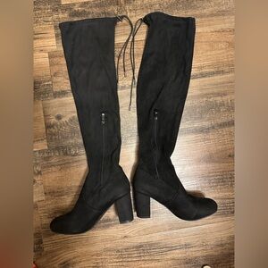 Black thigh high Women's Boots half zip and has drawstring on back to adjust